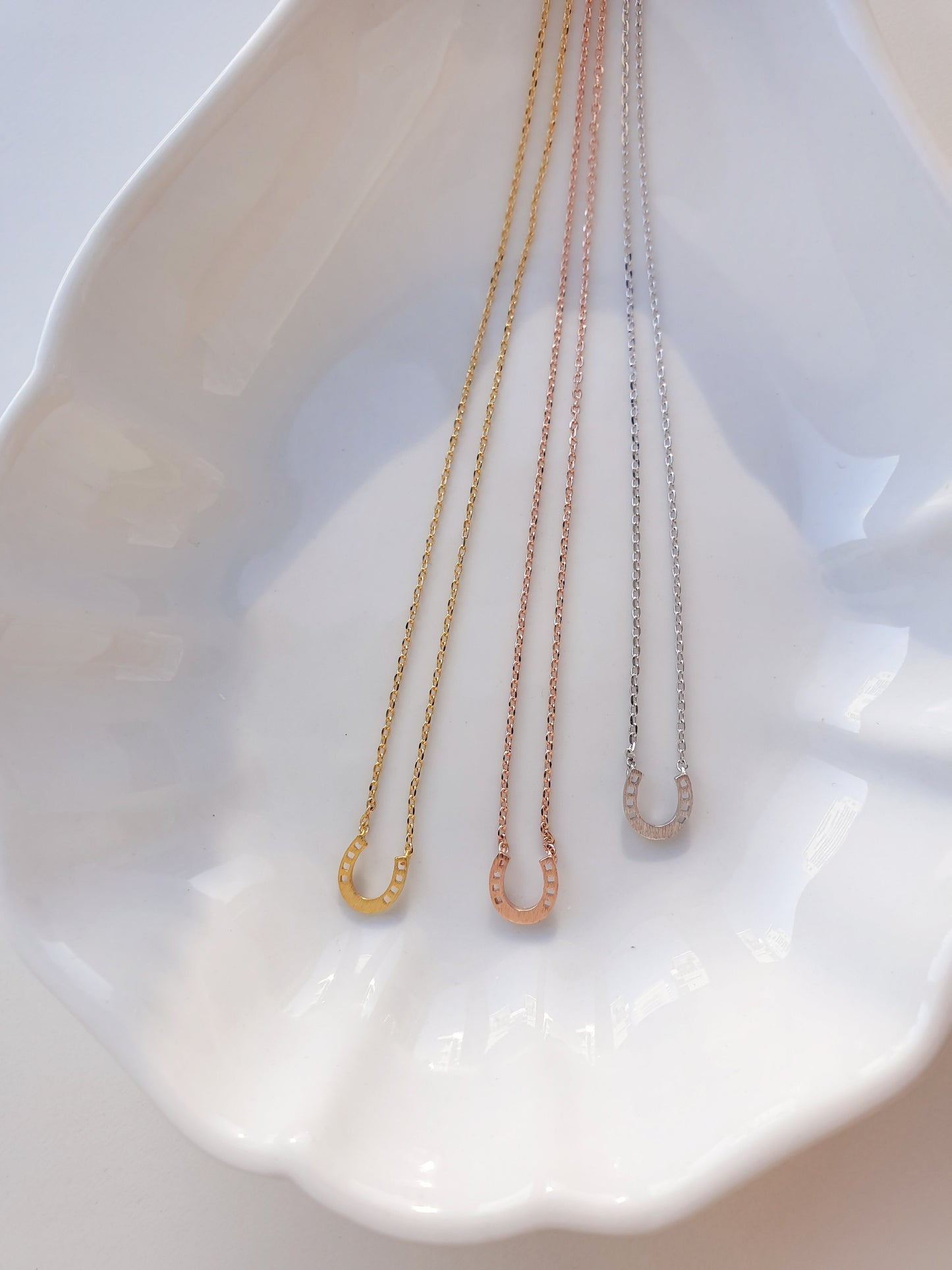 Horseshoe Tiny 4 Punch Pendant Necklace