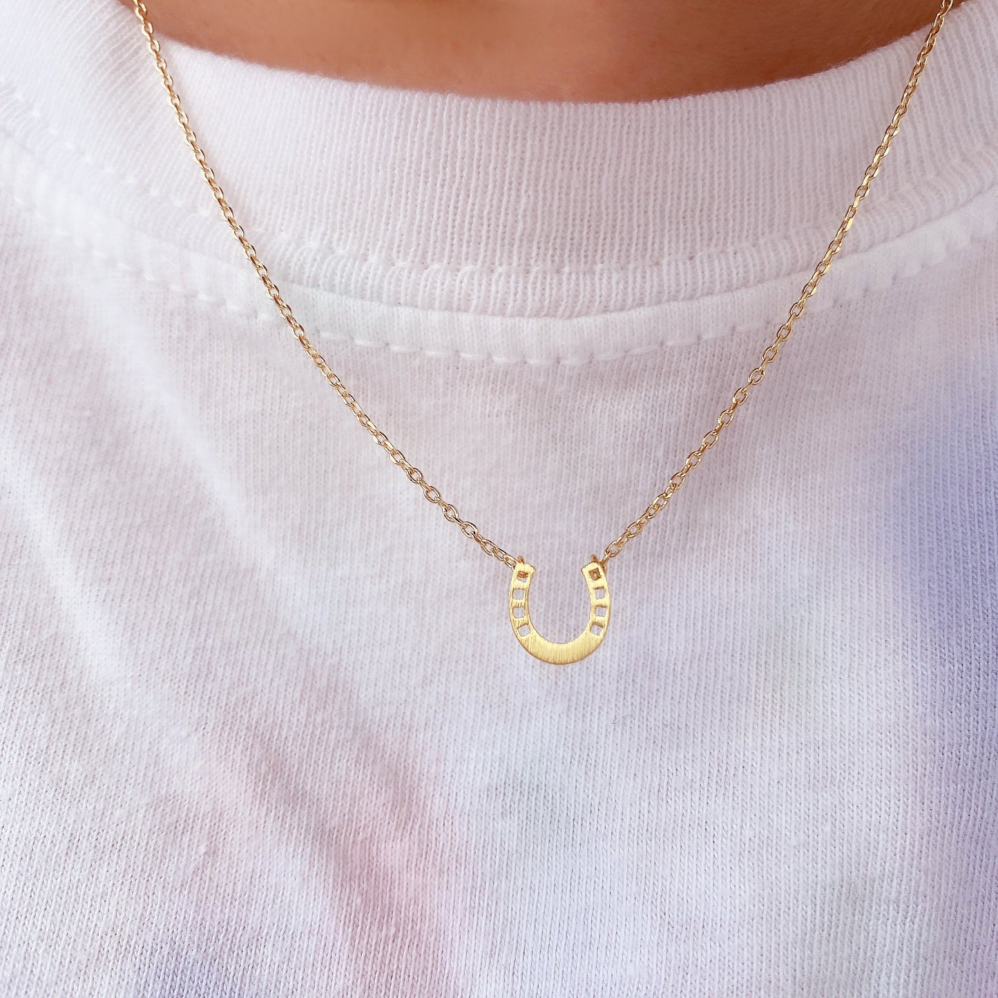 Horseshoe Tiny 4 Punch Pendant Necklace