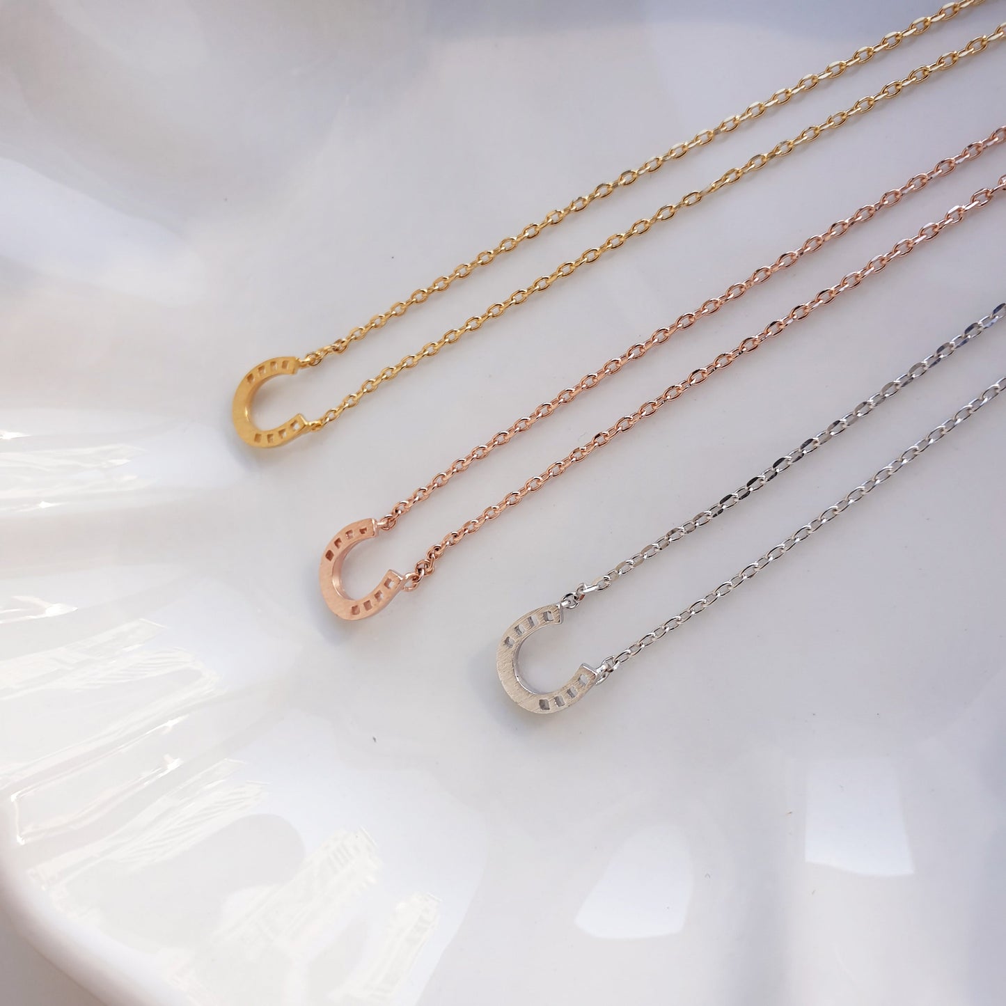 Horseshoe Tiny 4 Punch Pendant Necklace