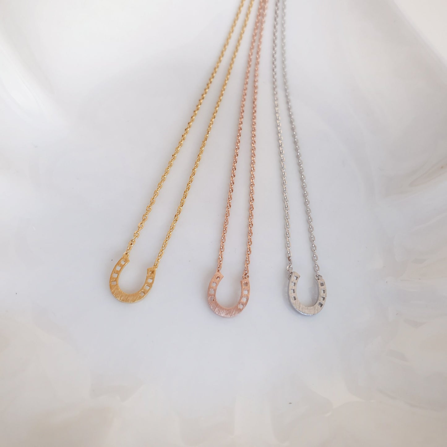 Horseshoe Tiny 4 Punch Pendant Necklace