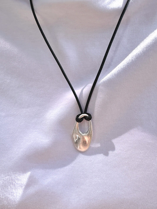 Cord Necklace with Oval Cut Out Pendant
