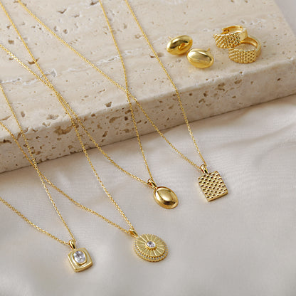 Oval Burst CZ Disc Pendant Necklace