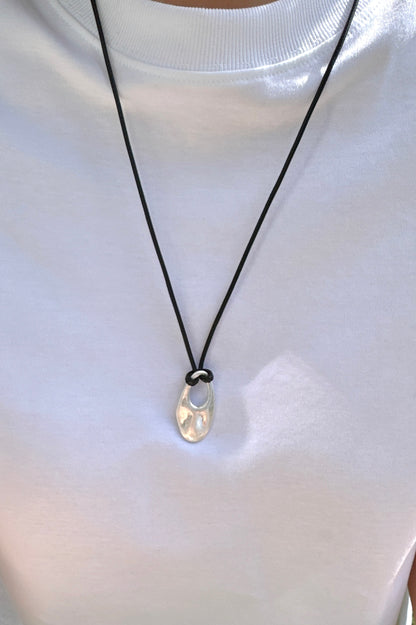 Cord Necklace with Oval Cut Out Pendant